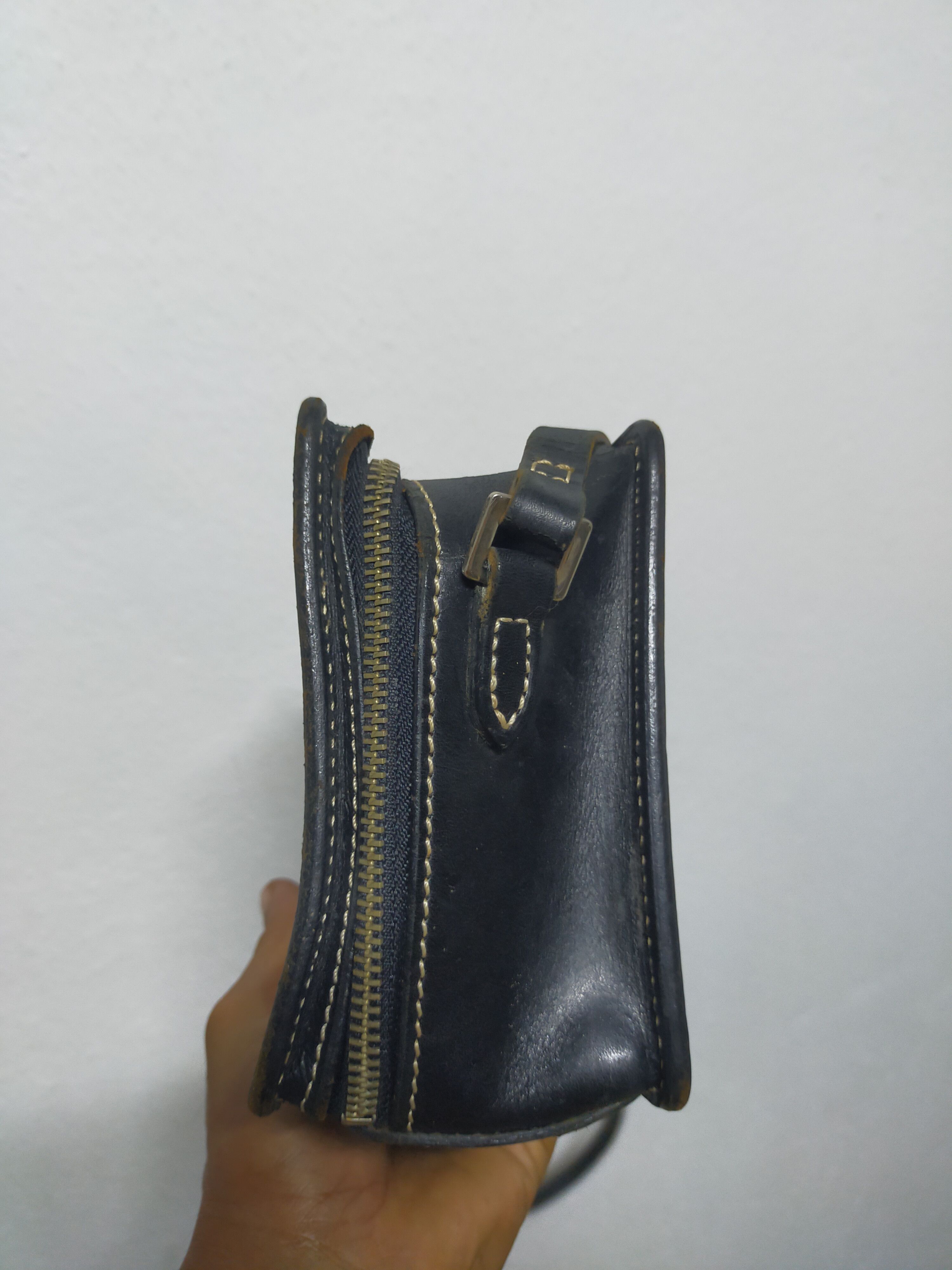 Vintage Courreges leather sling bags