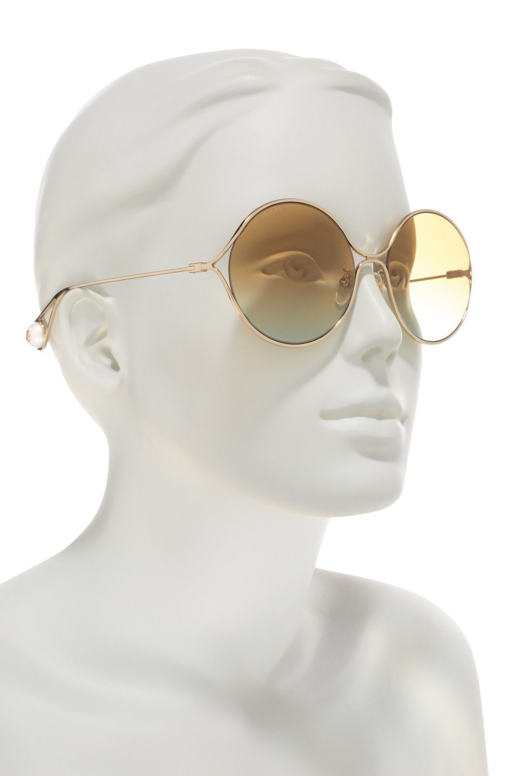 Gucci GG 0253S 005 Shiny Endura Gold Metal Round Sunglasses