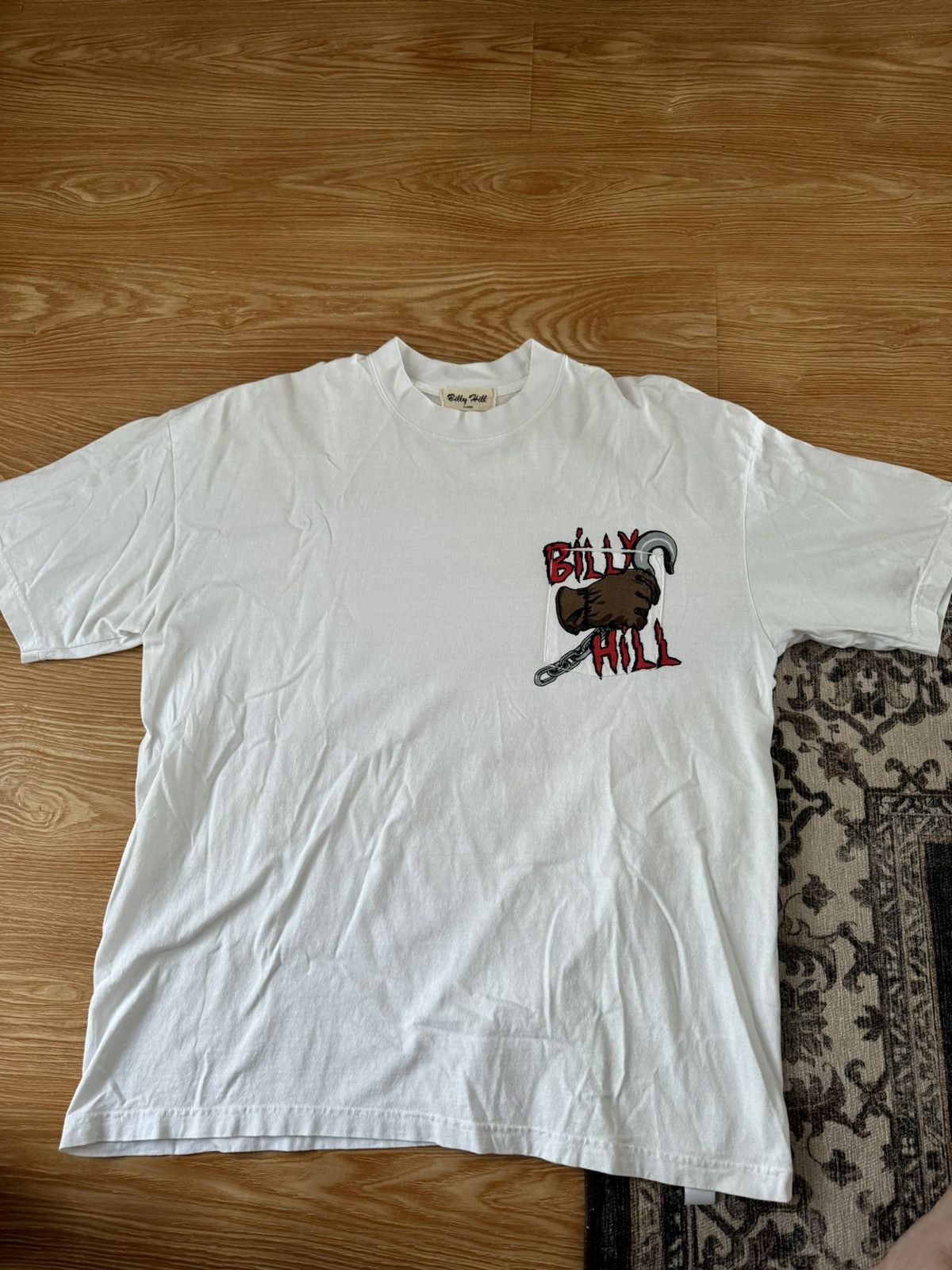 image of Billy Hill Hook Pocket Tee Monster Truck Graveyard in White, Men's (Size XL)