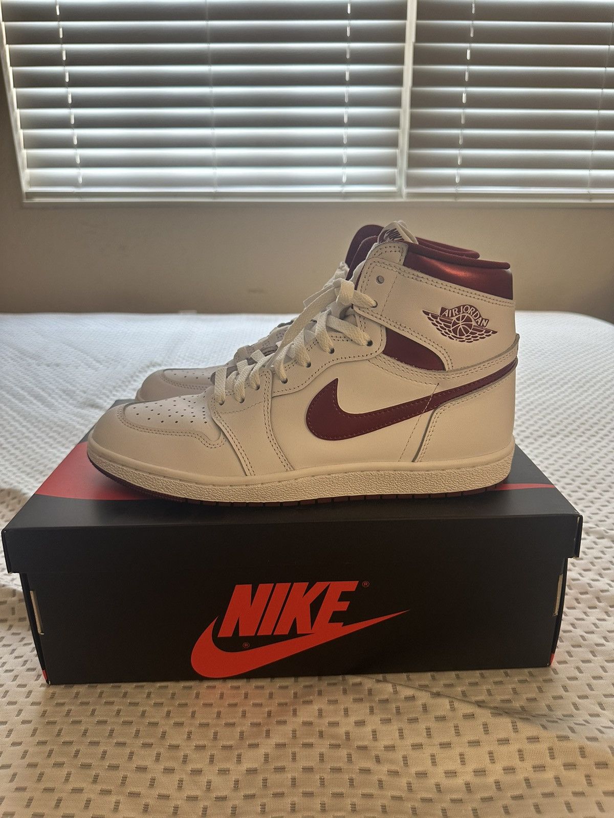 image of Jordan Brand 1 High 85 Metallic Burgundy Shoes in White, Men's (Size 11)