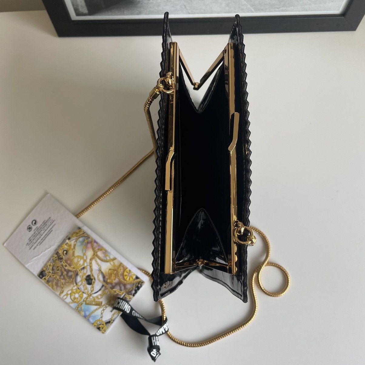 H&M × Moschino H&MOSCHINO condom clutch bag Size ONE SIZE - 7 Thumbnail