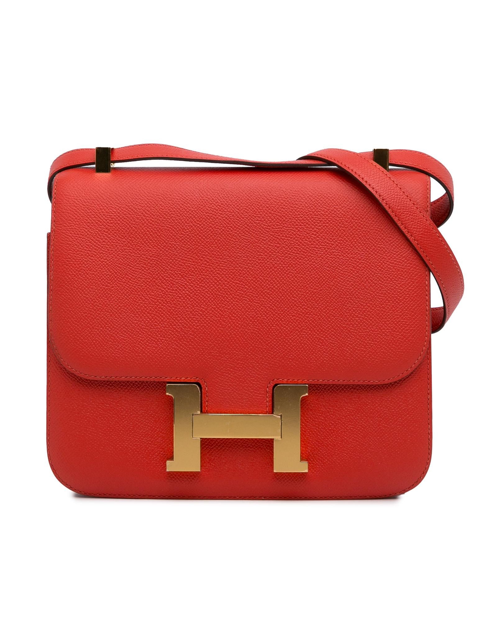 image of Hermes Leather Constance Crossbody Bag With H Buckle Closure in Red, Women's