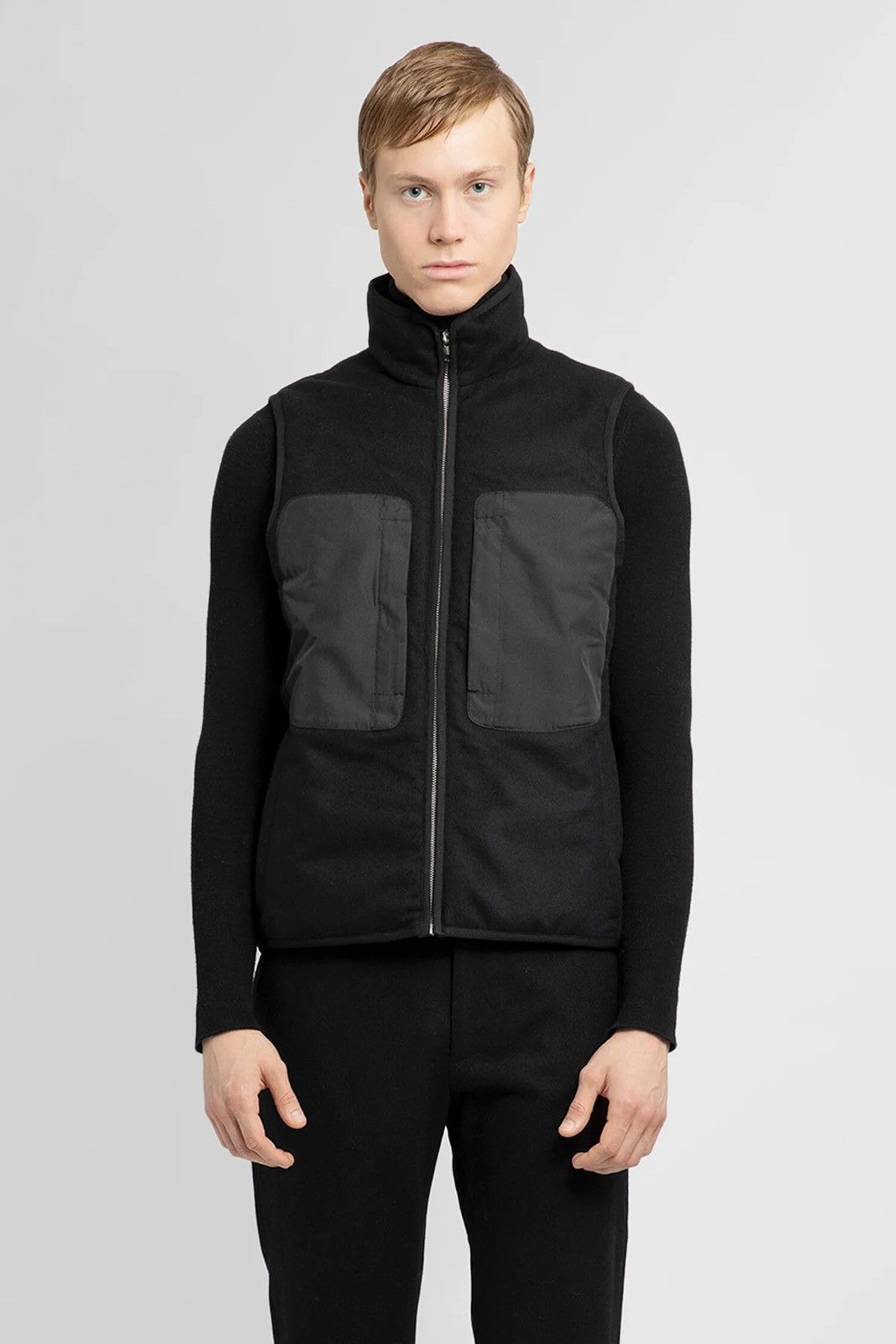 image of Arnar Mar Jonsson $775 Ranra Undir Virgin Wool Tech Vest in Black, Men's (Size Small)