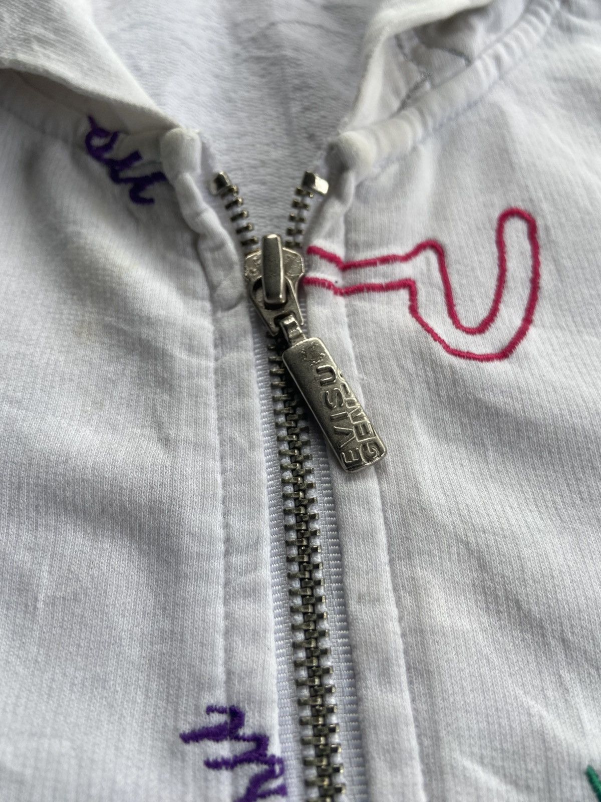 Evisu full-zip hoodie multicolored seagull and logo pattern.