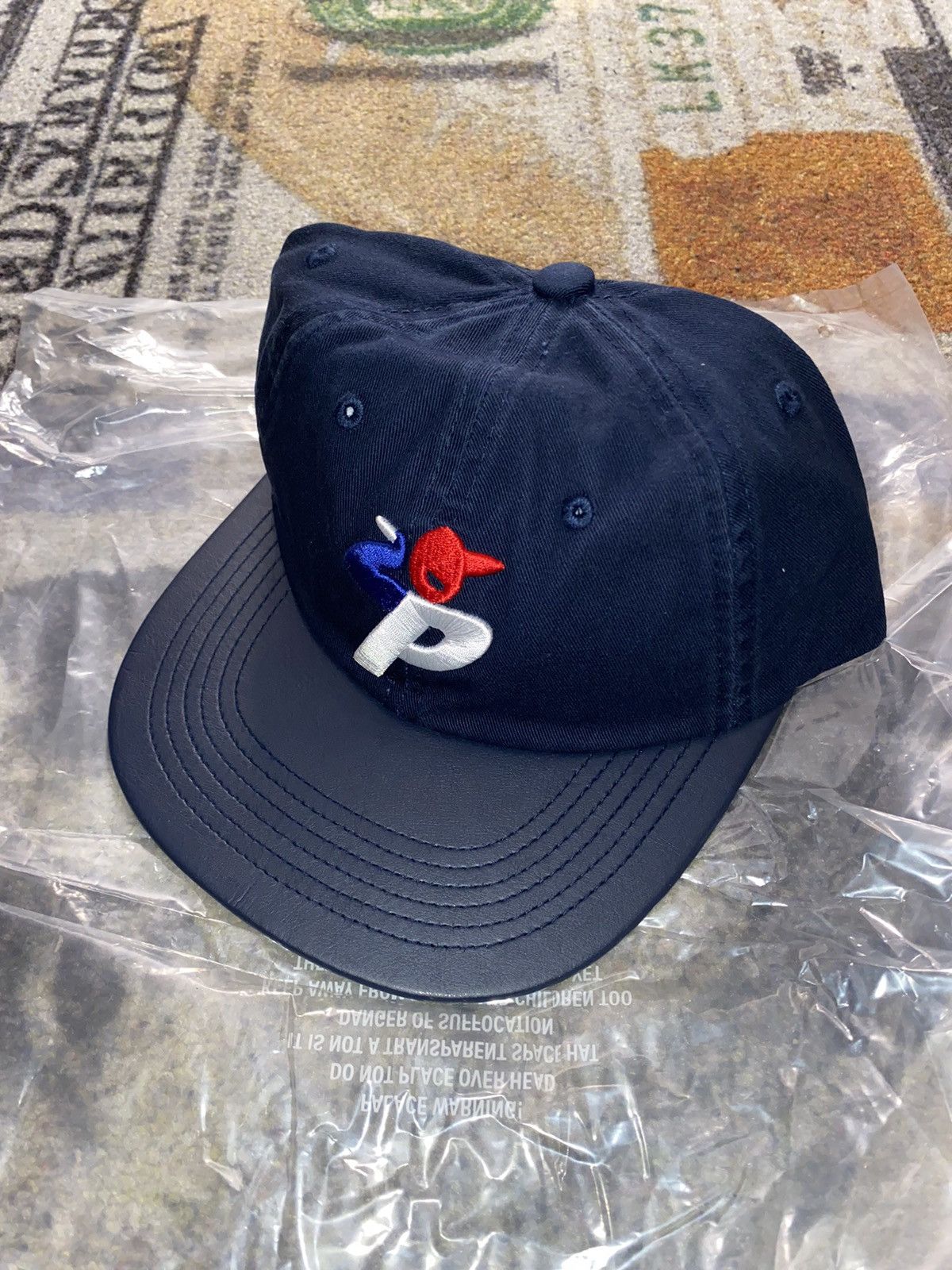 image of Palace Faux Leather Bunning Man Snapback in Navy, Men's