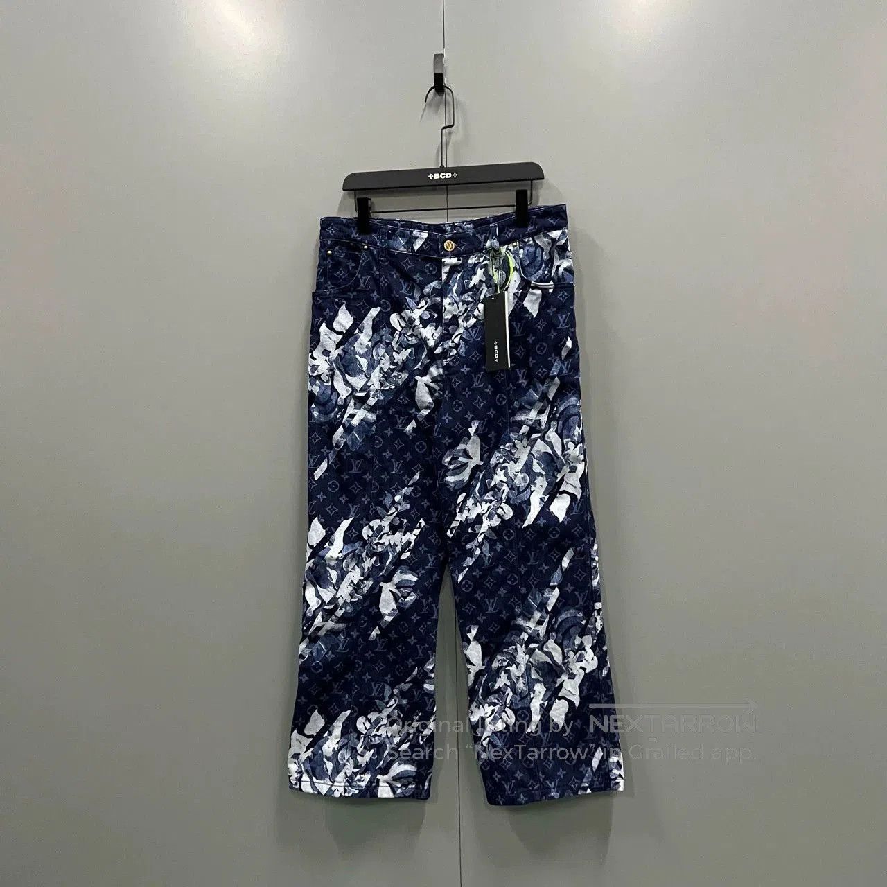 louis vuitton denim pants with monogram print.