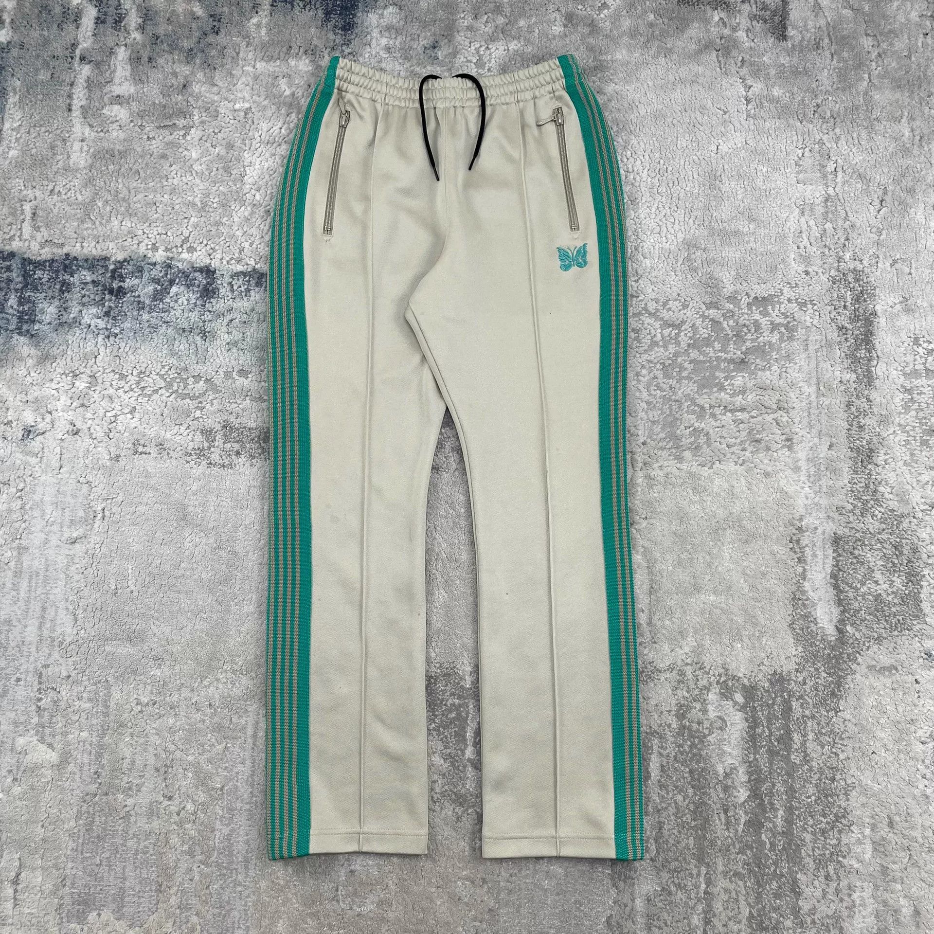 needles x js butterfly embroidered trackpants