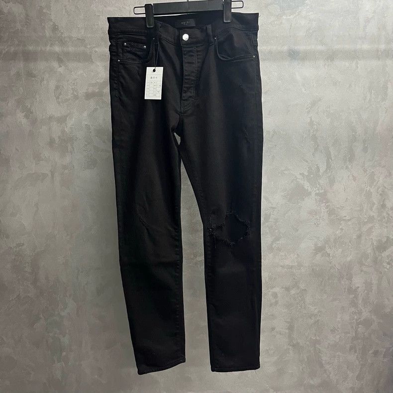 Amiri Amiri Black solid color knee-destructing casual jeans Size US 34 / EU 50 - 1 Thumbnail
