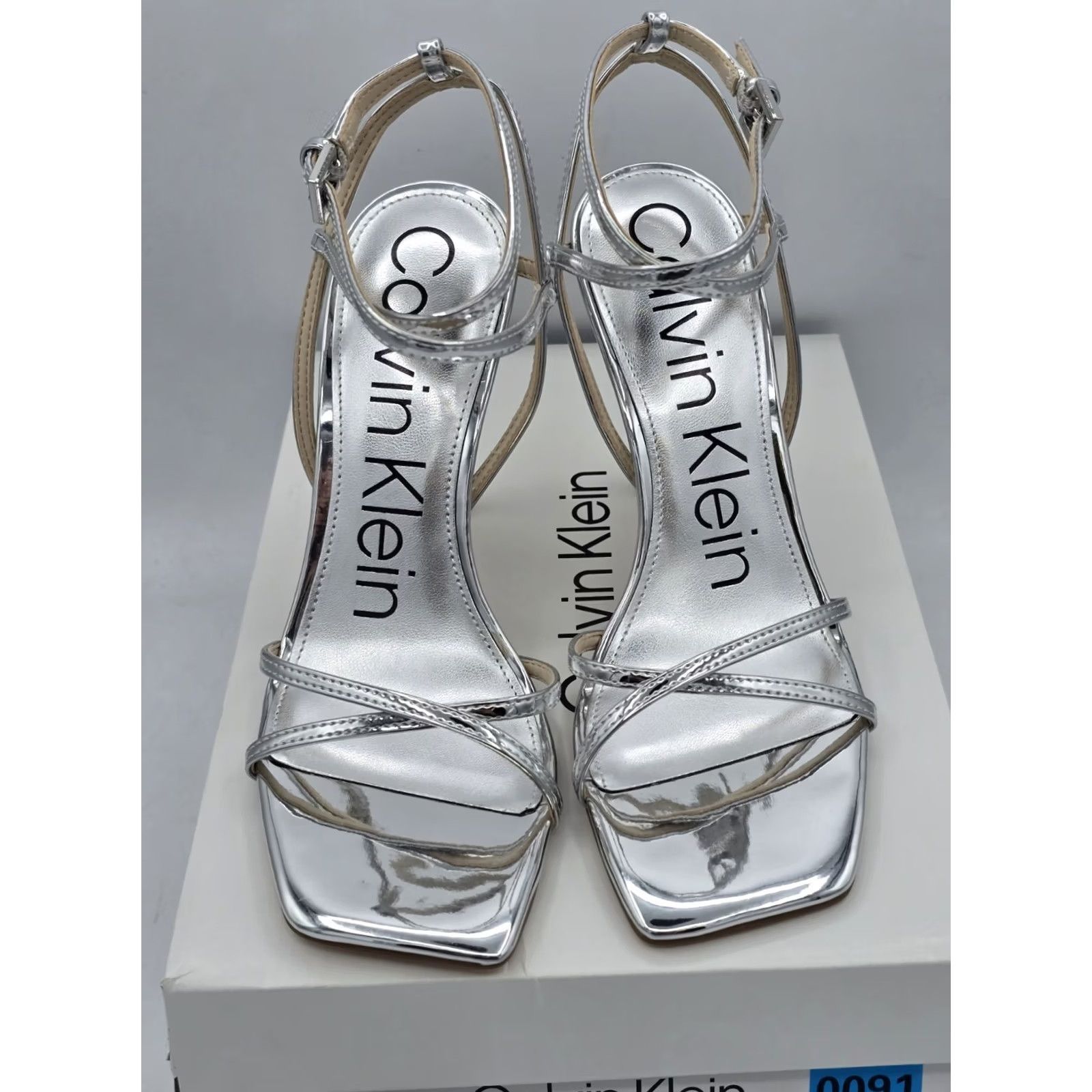 Calvin Klein Keywords: "Calvin Klein" is included, and important like "heel sandal" "silver" are incorporated Size US 8 / IT 38 - 4 Thumbnail