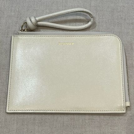 Jil Sander o1loc1c1124 Size: OS/ Giro Coin Purse in Beige Size ONE SIZE - 1 Preview