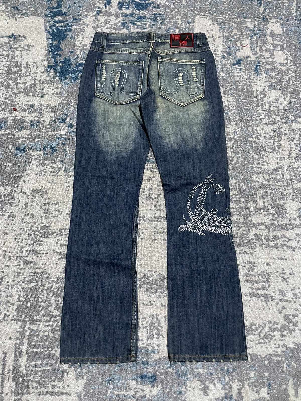 Image of Avant Garde x Distressed Denim 2000S Lie Ren Tou Dragon Embroidery Flare Bootcut Pants in Denim (Si