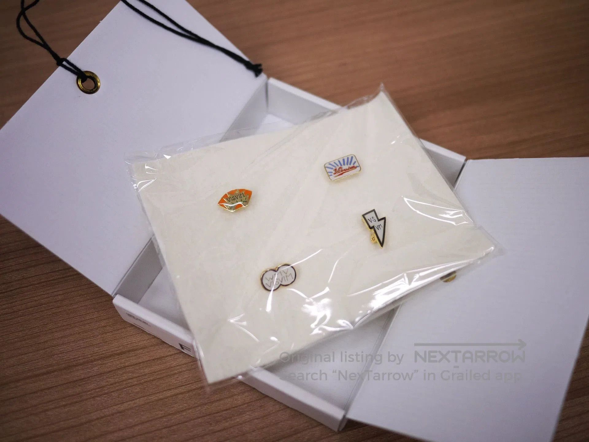 visvim lapel pin set with four pins.