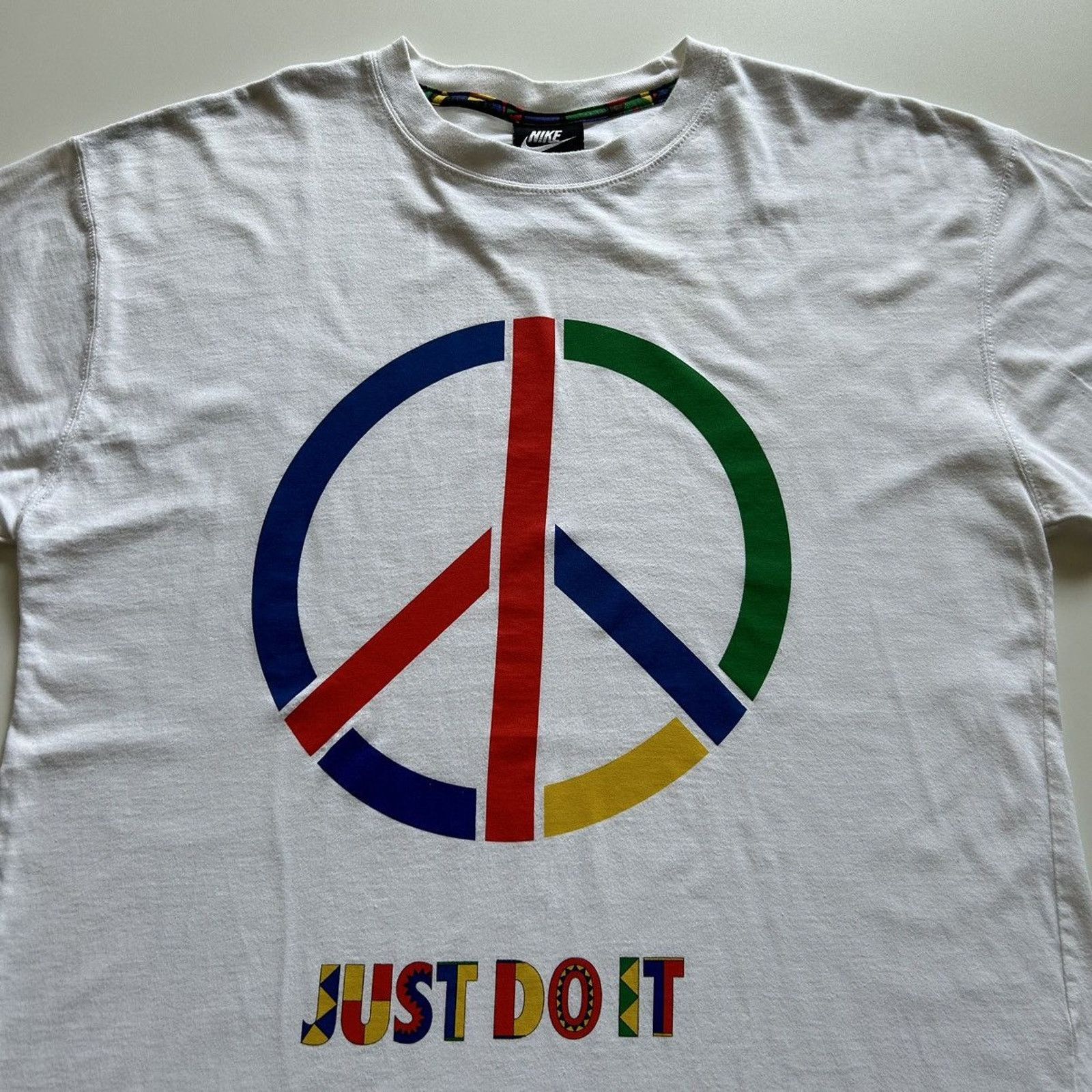 Nike Rare Vintage Vintage 2000s Nike Urban Jungle Peace Graphic T Shirt Medium Grailed