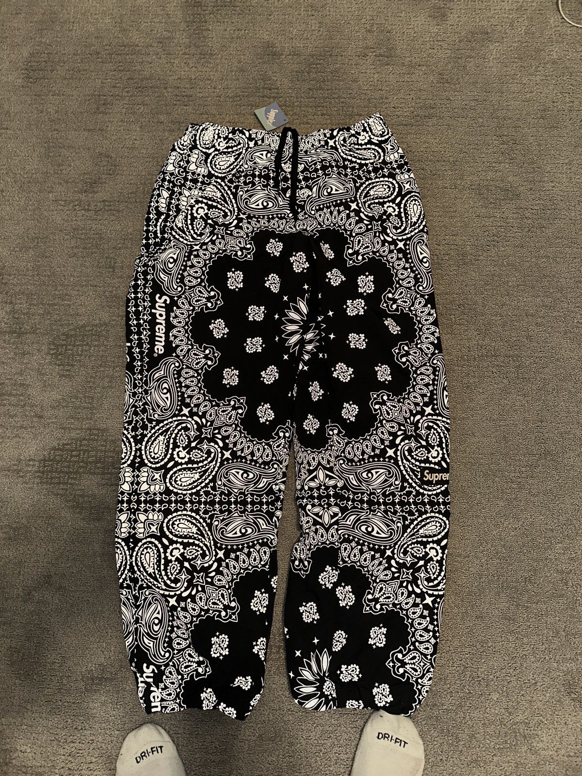 Supreme 2026 SUPREME REFLECTIVE BANDANA TRACK PANTS | Grailed