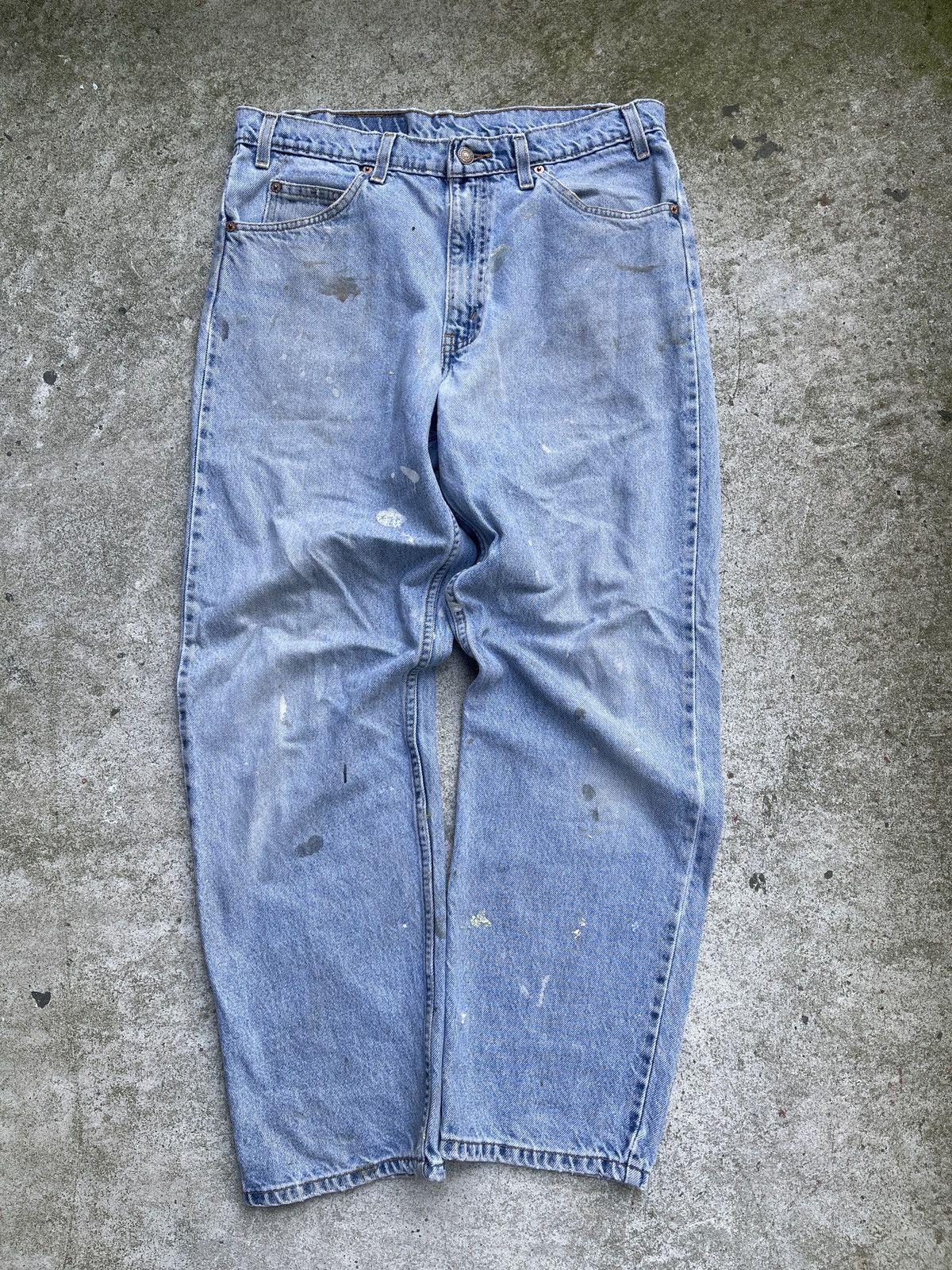 image of 80's Levis 550 Baggy Light Wash Paint Thrashed Jeans in Blue, Men's (Size 34)