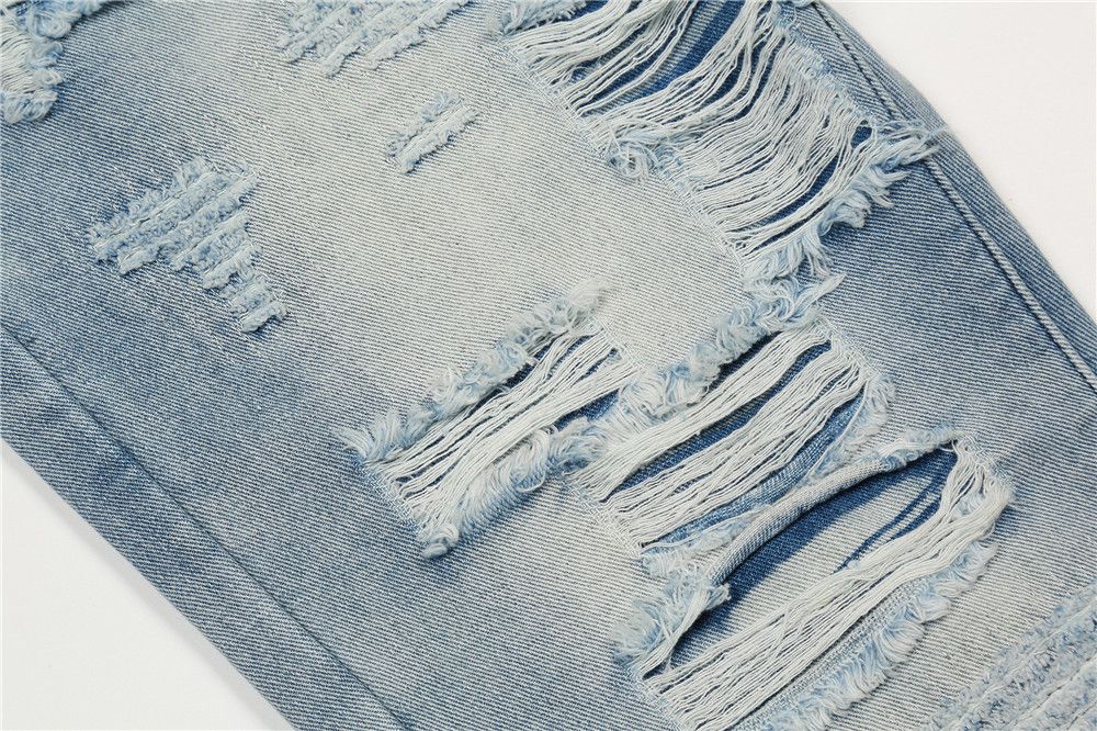 grunge damaged ripped washed flared jeans