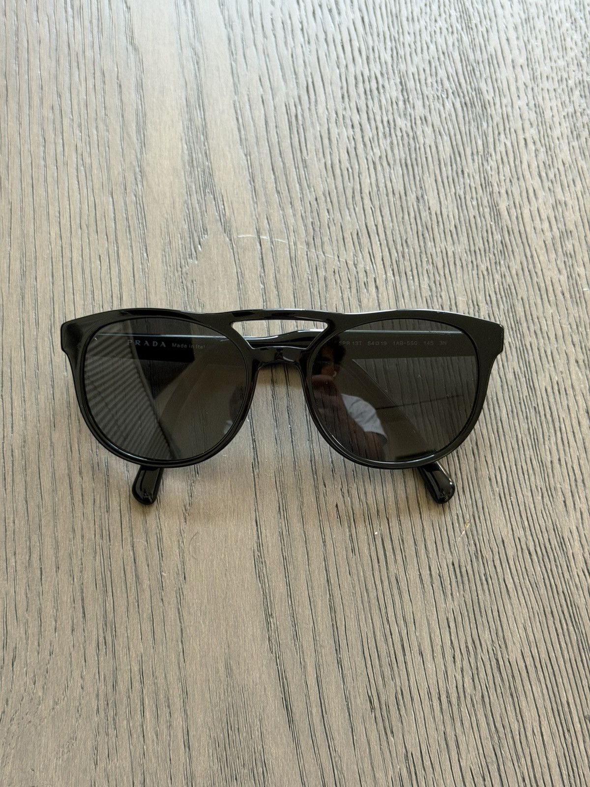 Prada Prada Black Sun Glasses Size ONE SIZE - 1 Thumbnail