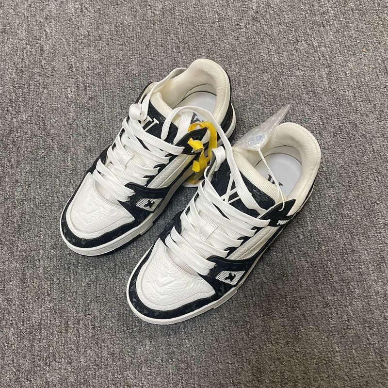 Louis Vuitton Trainer Low-Top Sneakers in Black and White -