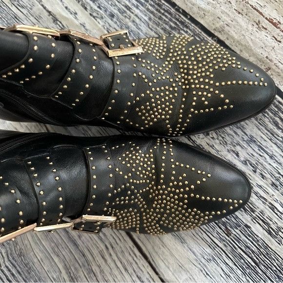 embellished black boots
