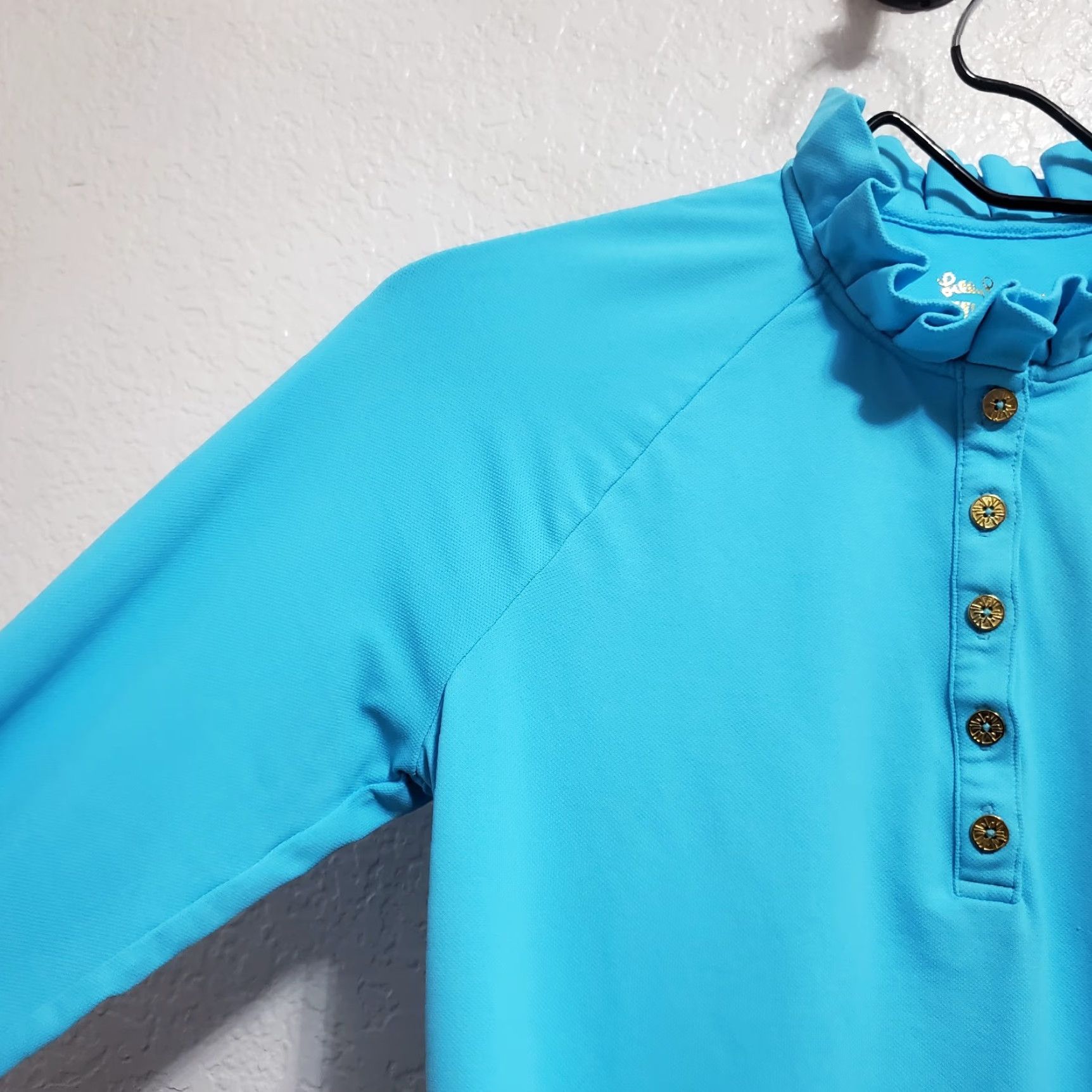 Lilly Pulitzer **Lilly Pulitzer Women's Blue Long Sleeve Ruffle Collar Polo Shirt** User: **Lilly Pulitzer Women's Blue Long Sleeve Ruffle Collar Polo Shirt** Size S / US 4 / IT 40 - 5 Thumbnail