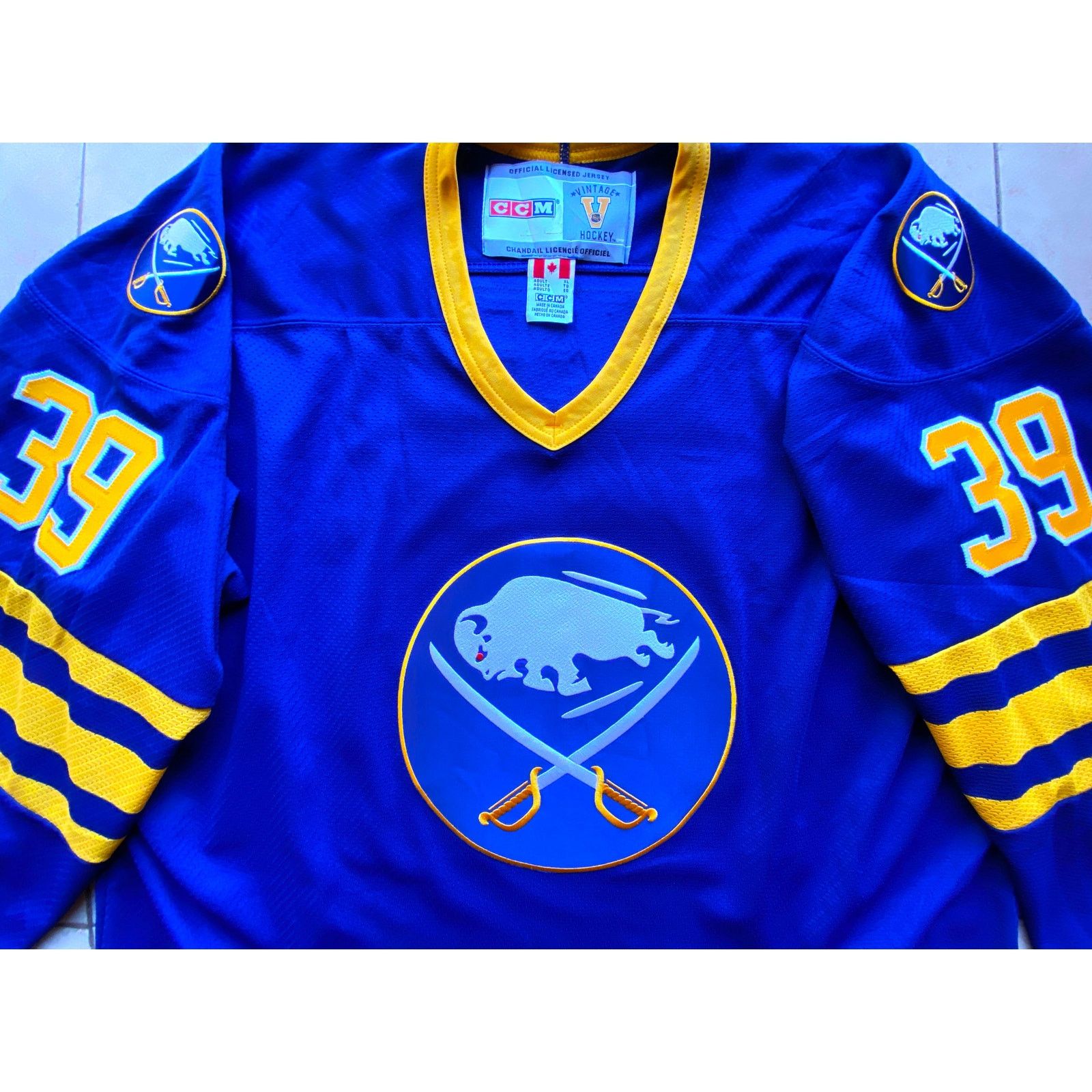 Ccm × NHL HASEK Buffalo Sabres CCM Vintage jersey XL blue sword NHL Size US XL / EU 56 / 4 - 6 Thumbnail