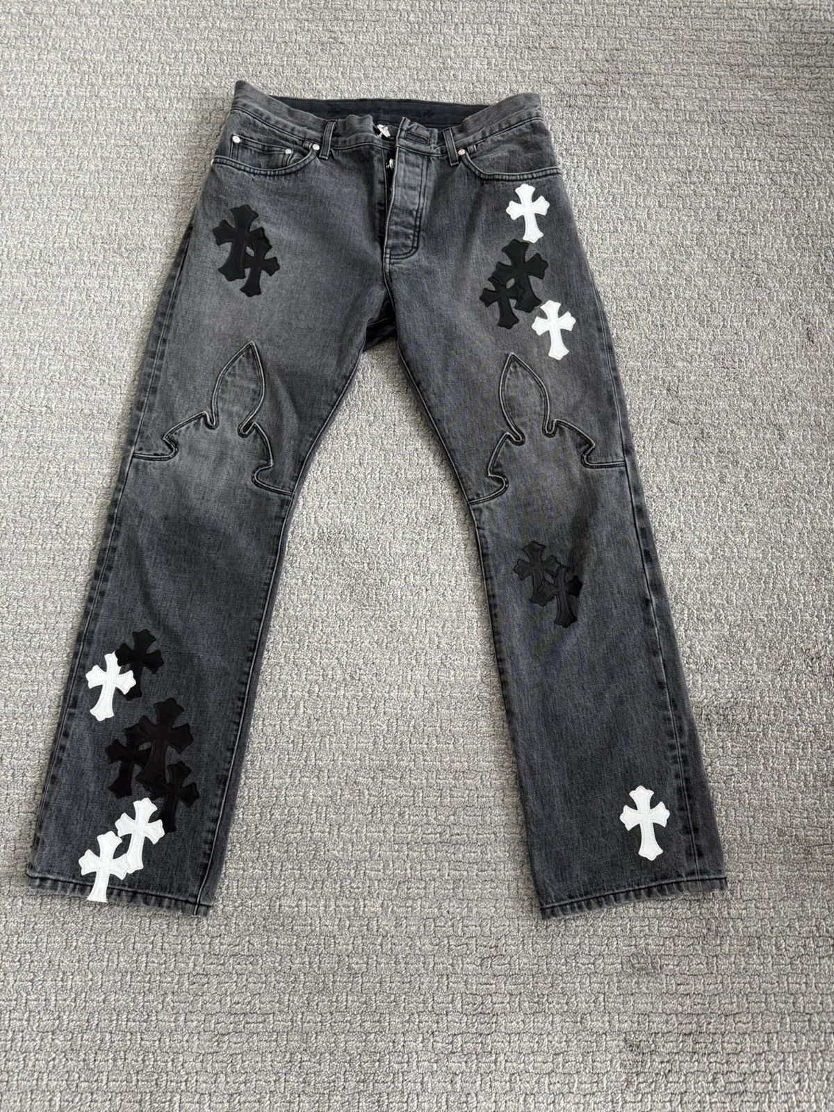 Chrome hearts jeans with Black and white leather patches
