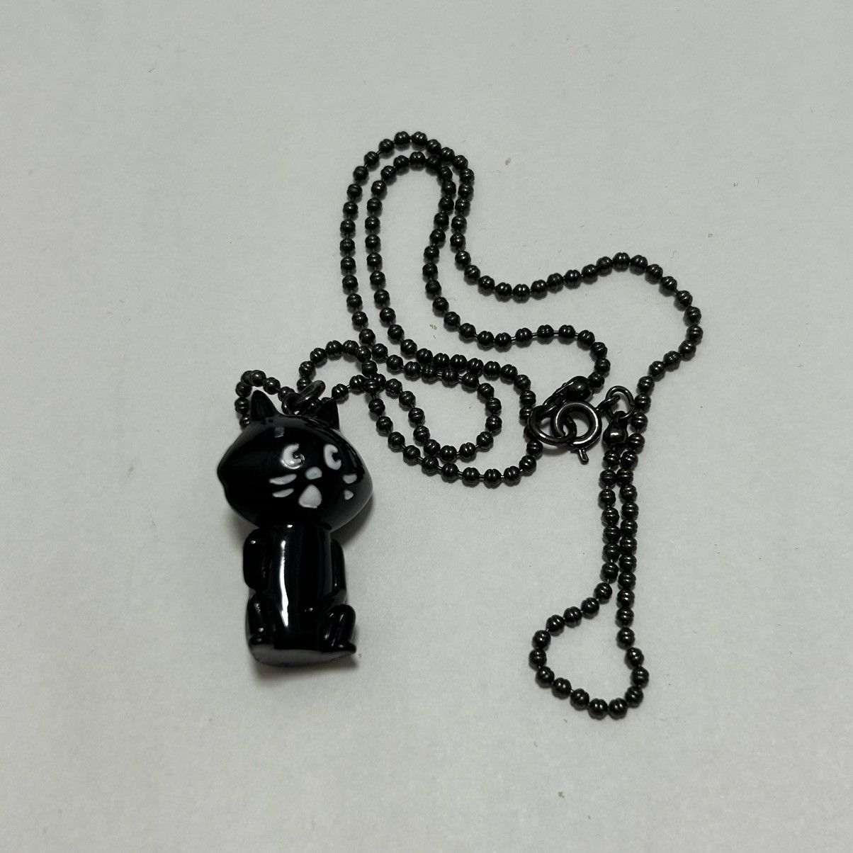 image of Issey Miyake x Ne Net Ne-Net Cat Necklace in Black, Men's