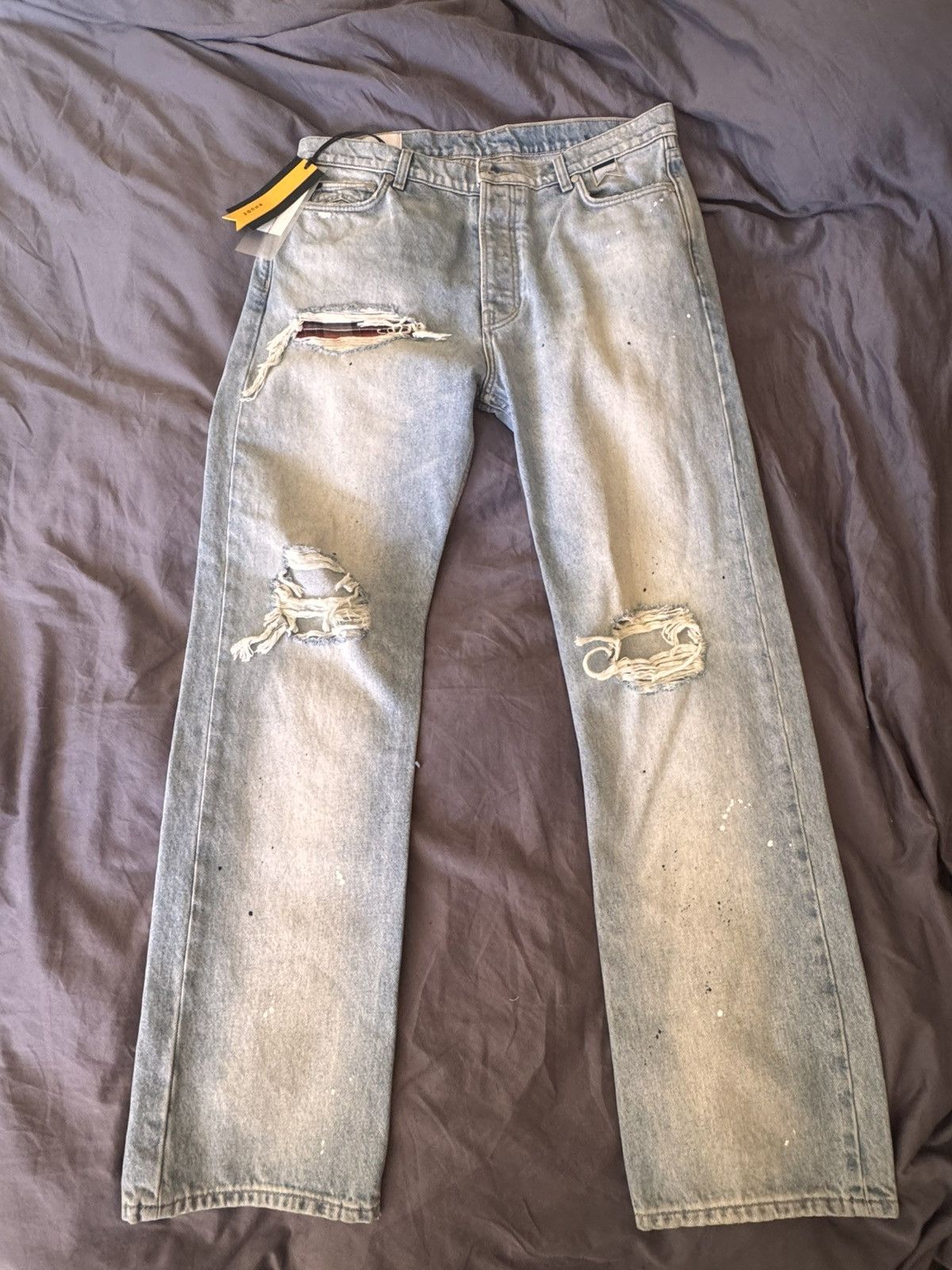 Rhude light wash destroyed