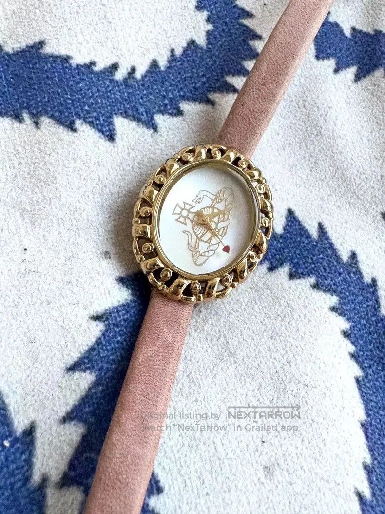 Vivienne Westwood Pink Saturn Snake Watch.