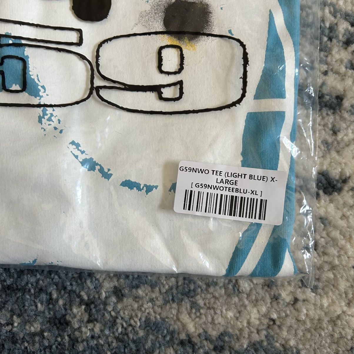Fuck The Population × G59 Records G*59 UNiTED NATiONS NEW WORLD ORDER G59NWO TEE UN HiGH NECK Size US XL / EU 56 / 4 - 6 Thumbnail