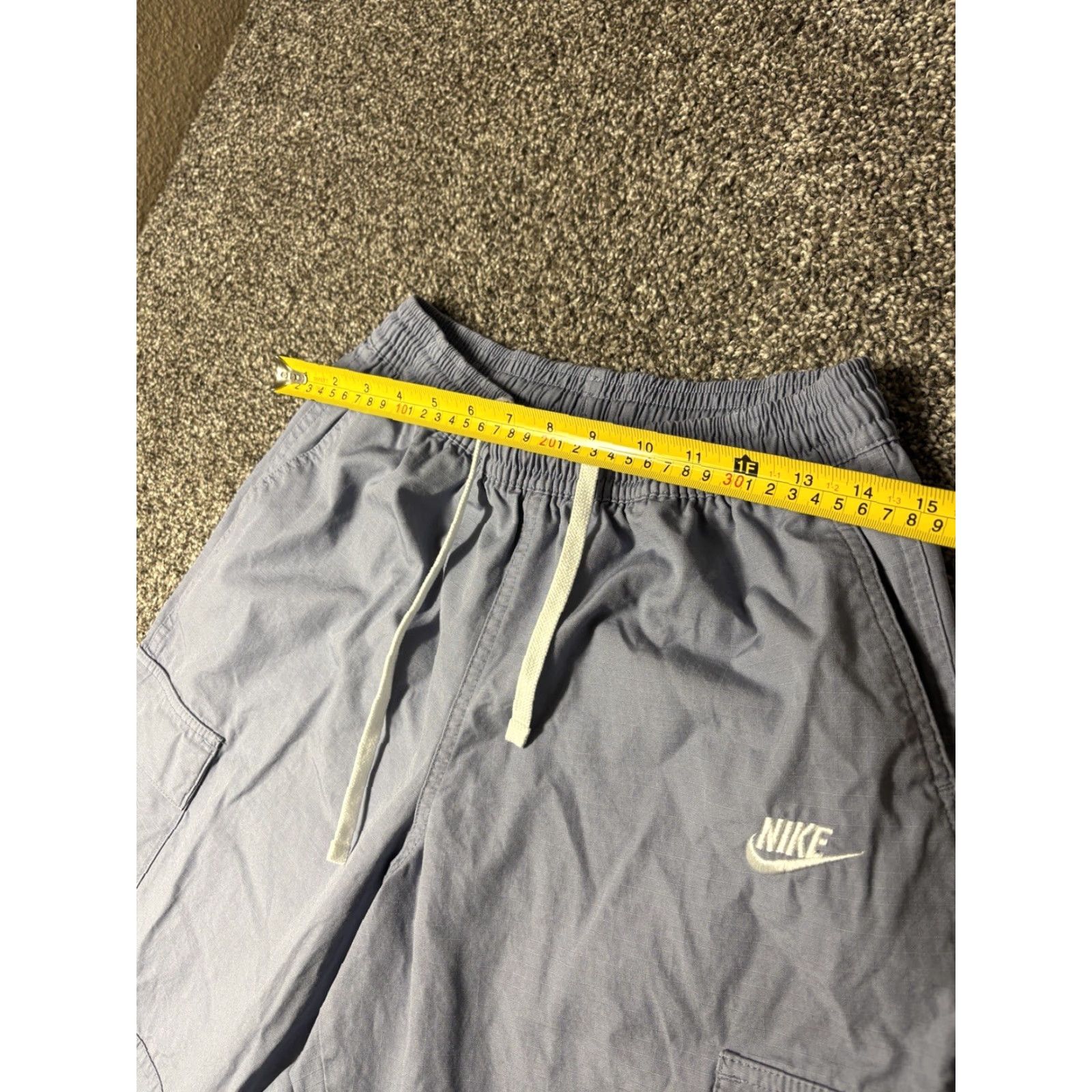 Nike Nike Pants Mens Small Blue Woven Cargo Ripstop Snap Pockets DX0613 Cutoff RW Hem Cargo Pocket Elastic Waist Pockets Mens Blue Nike Size US 29 - 4 Thumbnail