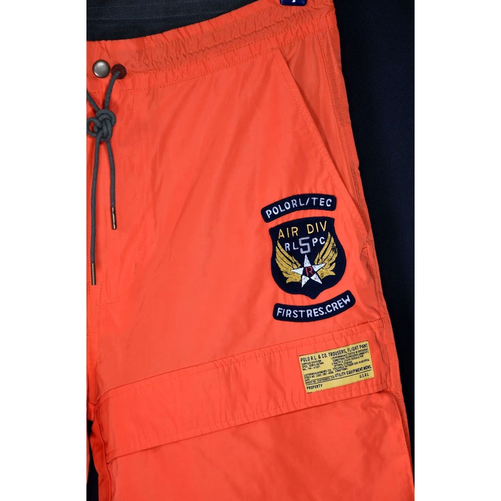 Polo Ralph Lauren Polo Ralph Lauren Flight Cargo Pants Orange M Men Casual Nylon Polyester Front Rise Cargo Pocket Inseam 27.56in (70cm) 40.55in Length Size US M / EU 48-50 / 2 - 4 Thumbnail