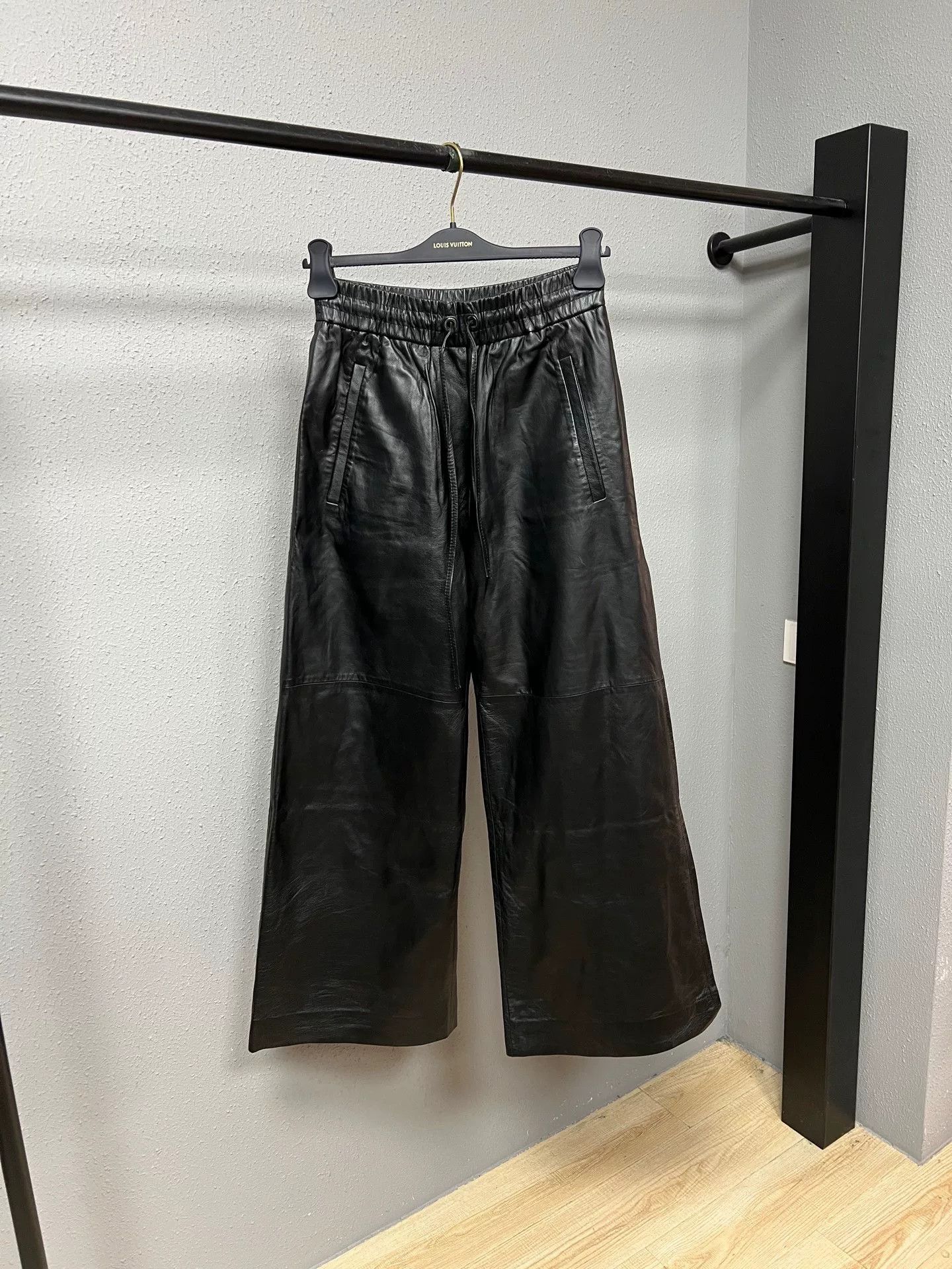 black wide-leg leather pants