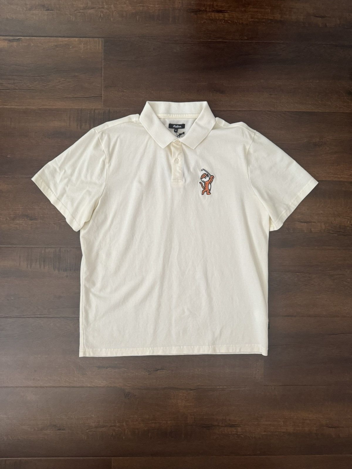image of Malbon Golf Tiger Buckets Polo in Cream, Men's (Size Medium)