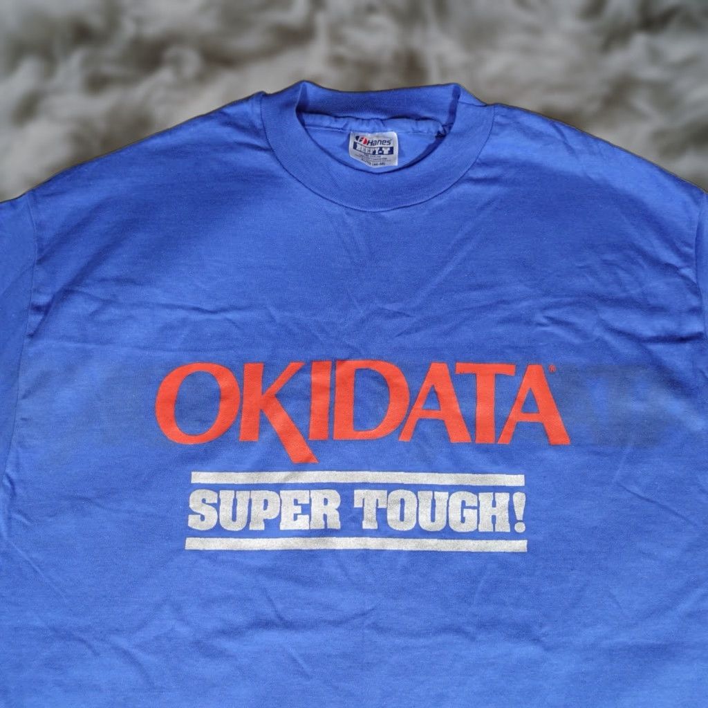 Vintage VINTAGE Oki Electronics Promo T Shirt Mens XL Blue 90s Shirt Mens XL Blue 90s Vintage T-Shirt Logo Graphic Print United States Made in USA 1990s Men Size US XL / EU 56 / 4 - 1 Thumbnail