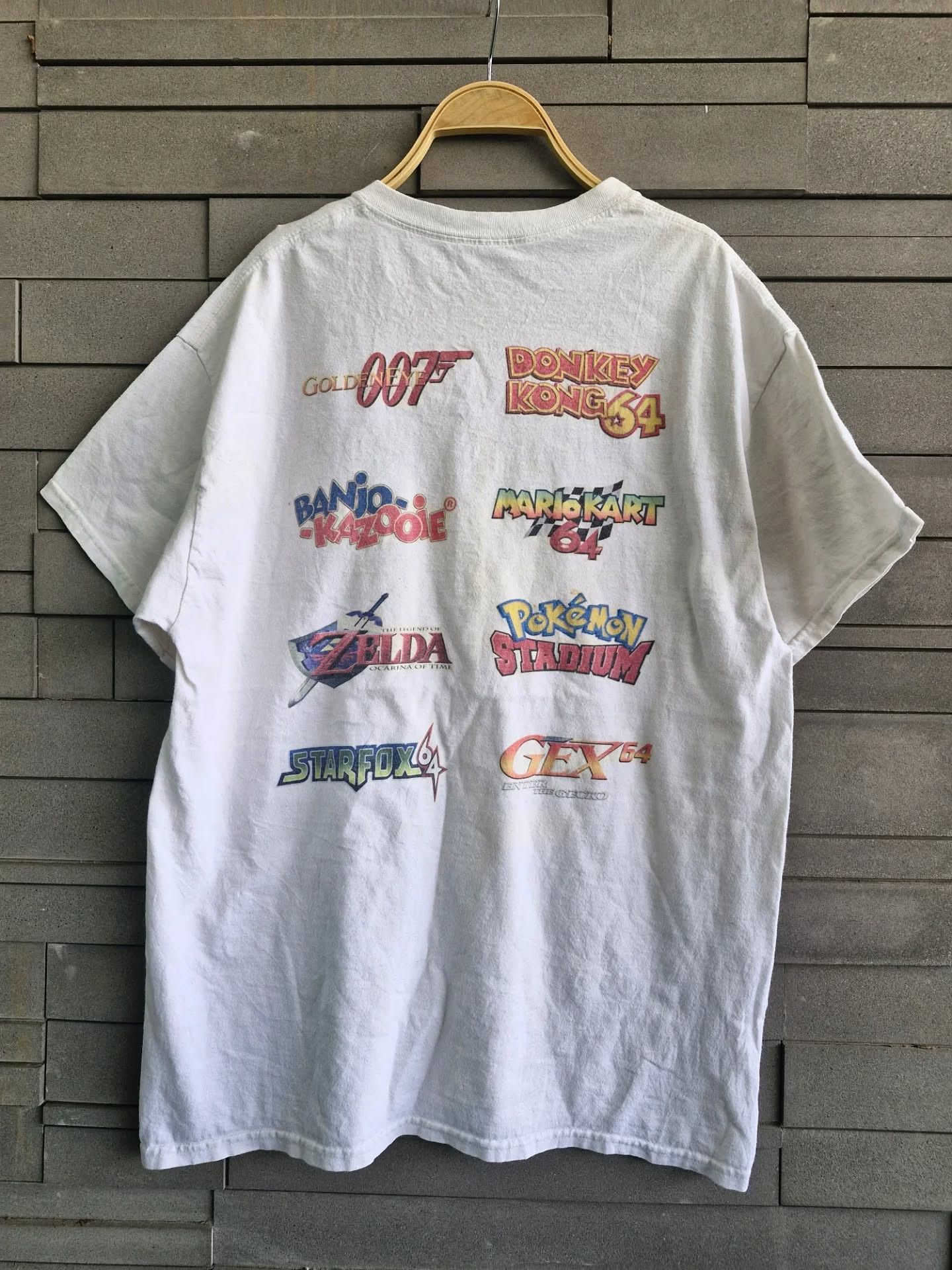 Nintendo NINTENDO​ 64 MIDLOGO AND GAMEPLAN PROMOTE Tees. Size US L / EU 52-54 / 3 - 4 Thumbnail