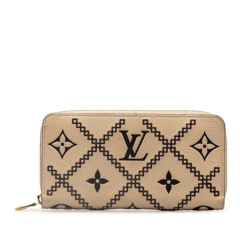 image of Louis Vuitton Monogram Empreinte Zippy Wallet in Brown, Women's