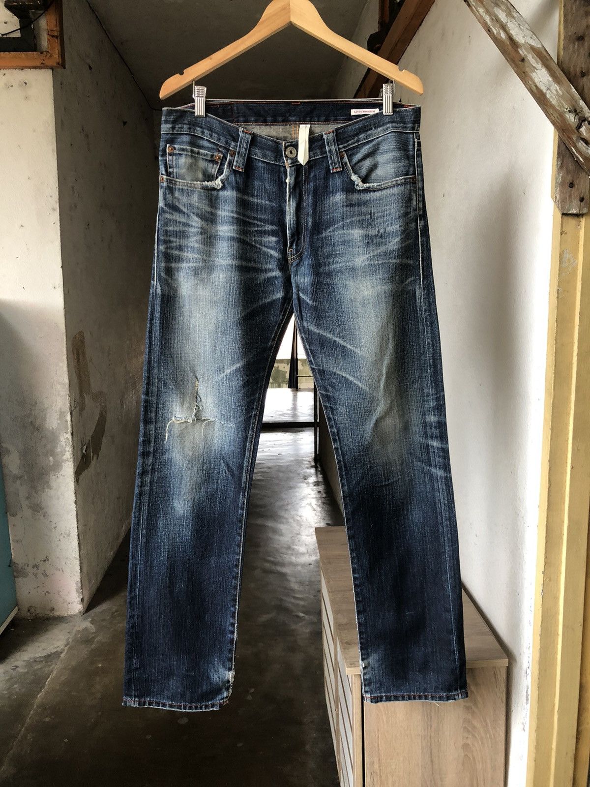 image of Levis Premium 505 Straight Cut Distressed Jeans in Blue, Men's (Size 34)