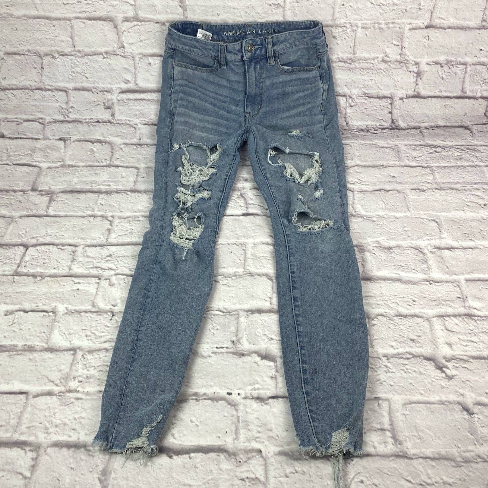 American Eagle Outfitters American Eagle Jeans Junior Teen Size 4 Jegging Light Wash Distressed Frayed Hem Size 27" / US 4 / IT 40 - 3 Thumbnail