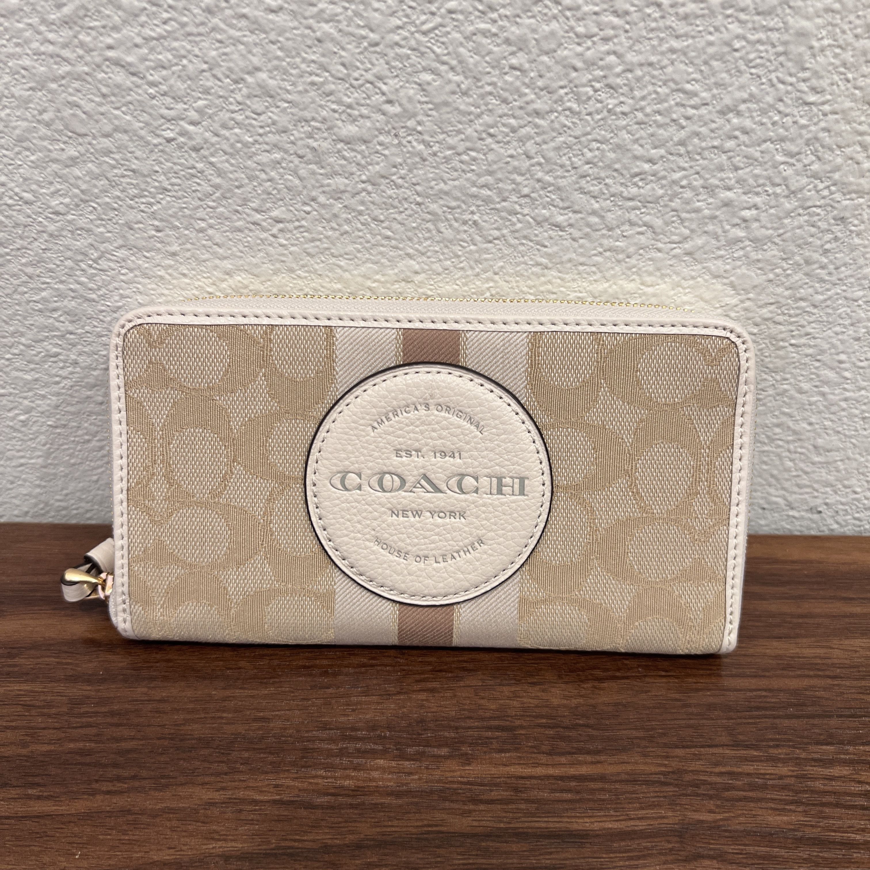 Dempsey Large Phone Wallet With Stripe And Coach Patch