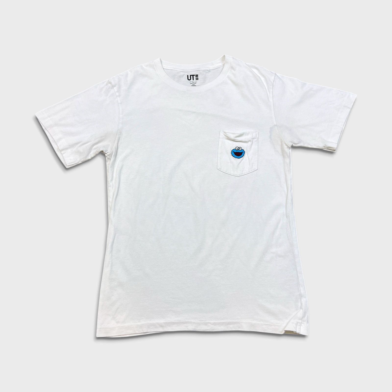 Kaws × Uniqlo KAWS Uniqlo Sesame Street Cookie Monster Pocket Tee T Shirt Size US L / EU 52-54 / 3 - 1 Thumbnail
