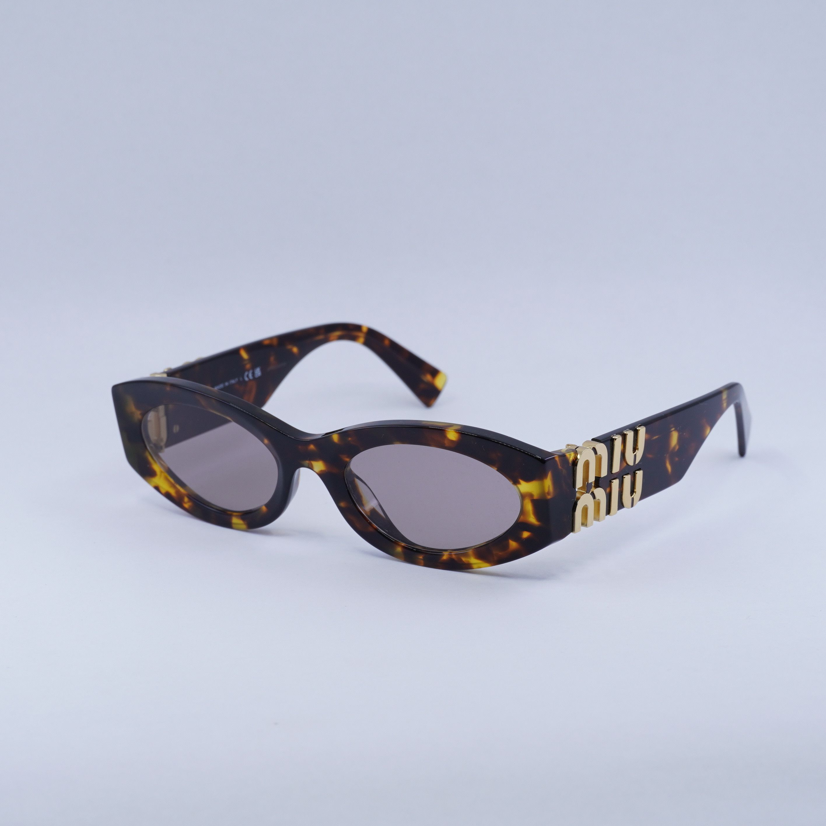Miu Miu Miu Miu MU11WS 14L20I Sunglasses Havana Oval Frame Size ONE SIZE - 1 Thumbnail