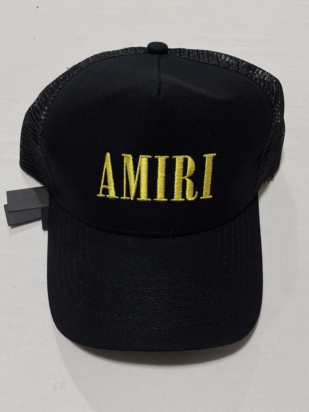 Amiri Amiri Yellow Words Black Cap | Grailed