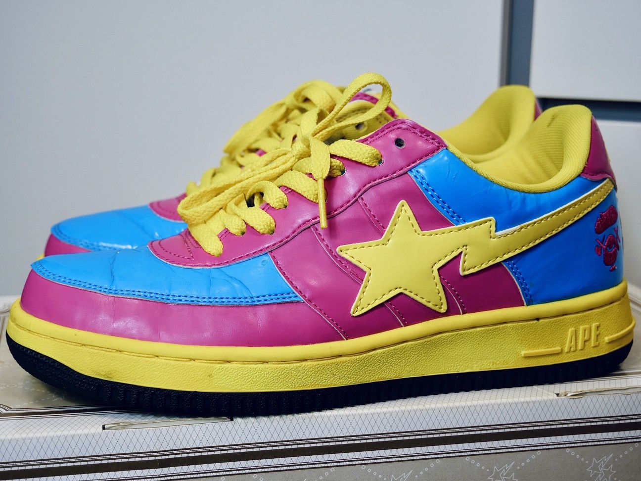 BAPE X KAWS FS 029 PINK BLUE YELLOW BAPESTA Footwear