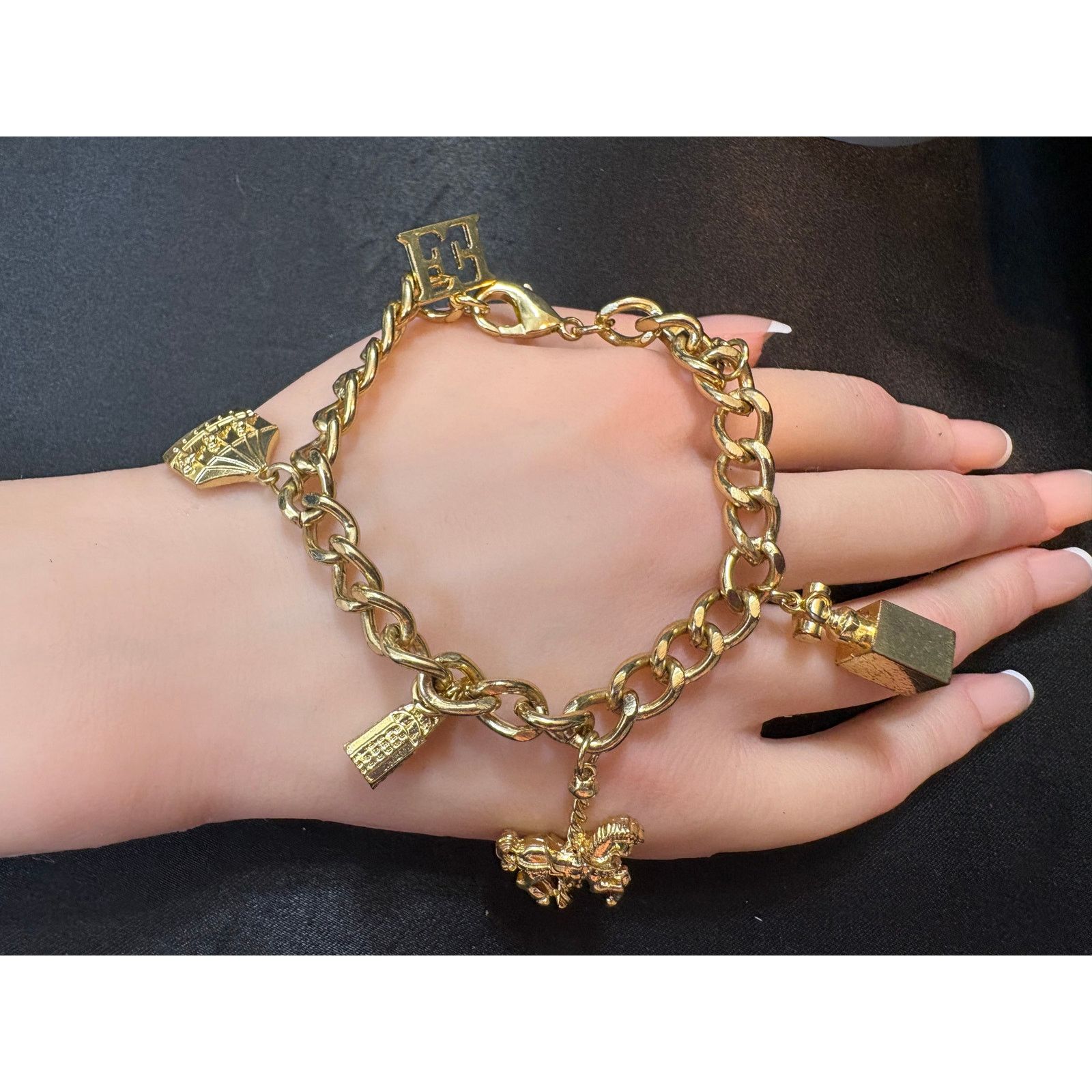 Escada Escada Gold-Tone Carousel Charm Bracelet Signature E 7.25" Size ONE SIZE - 1 Thumbnail