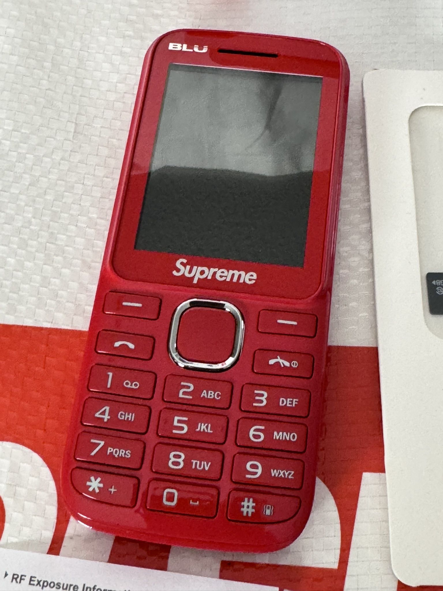 Supreme blu burner phone 2024 red