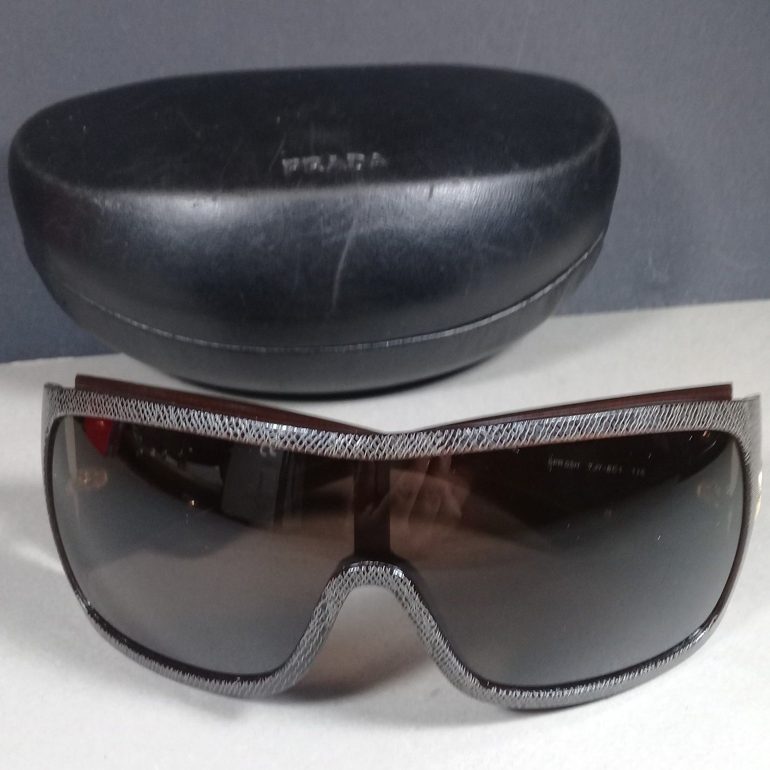 image of Prada Spr 05H 7Jy-8C1 115 in Brown/Gold, Women's
