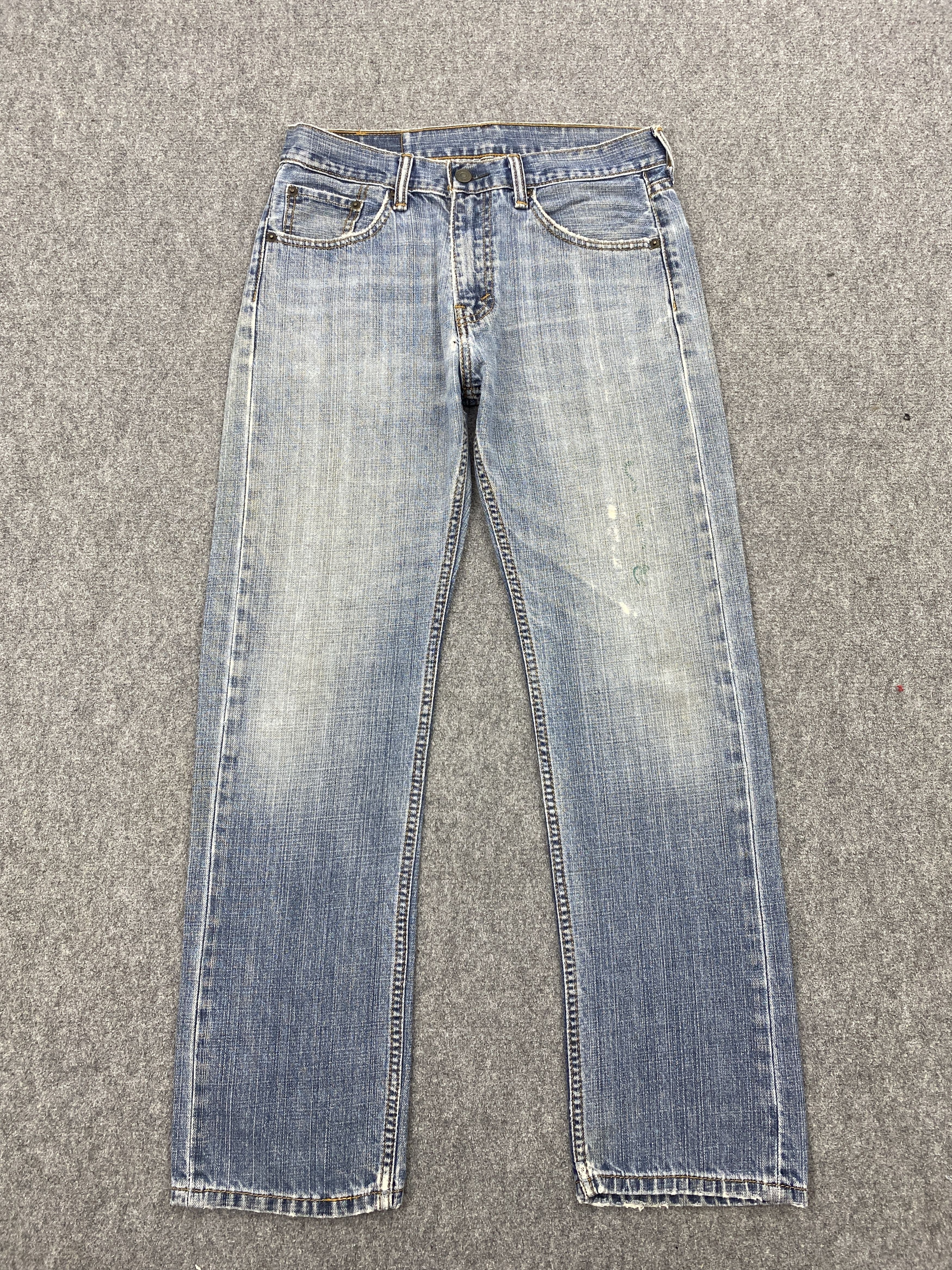 Distressed Vintage Levi's 505 Faded Blue Jeans