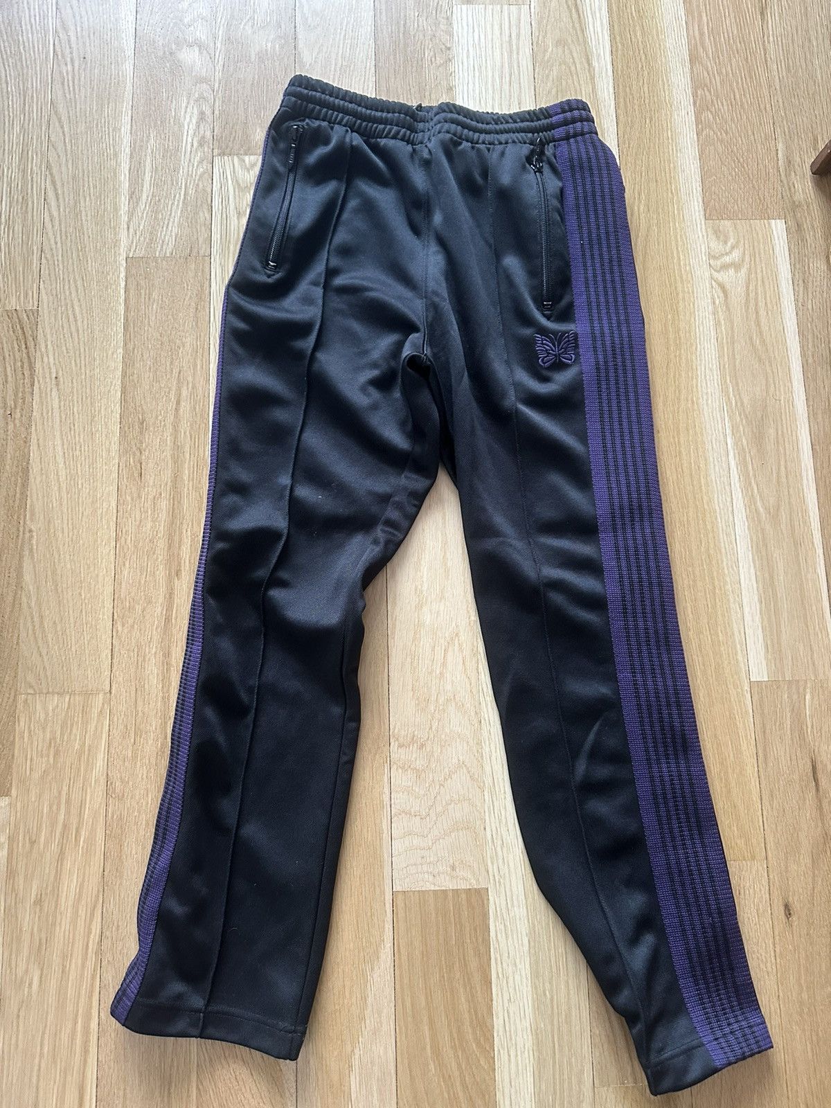 Needles Needles Narrow Track Pants (Black / Purple) SIZE 2 | Grailed