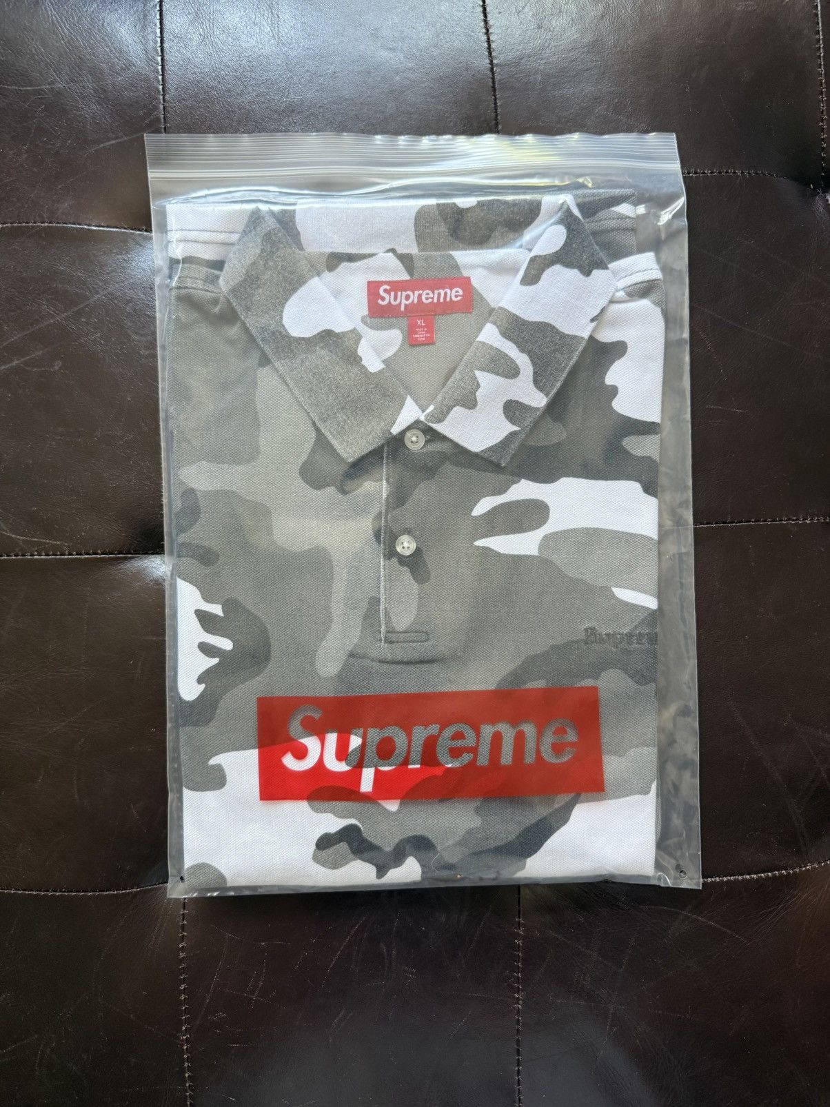 トップス Supreme Washed Camo Polo Supreme Washed Camo Polo (SS25) - $98